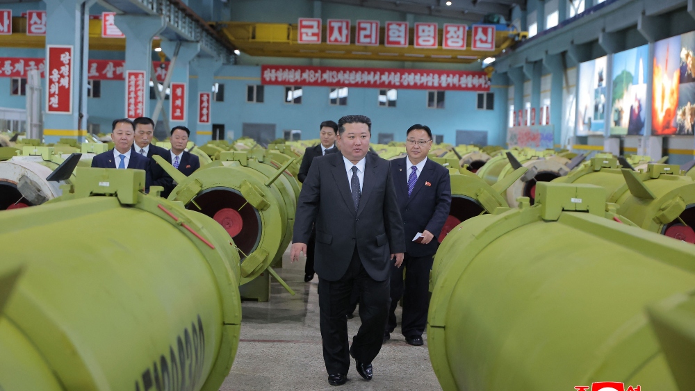 North Korea's Kim orders factories to make more missiles in 2026